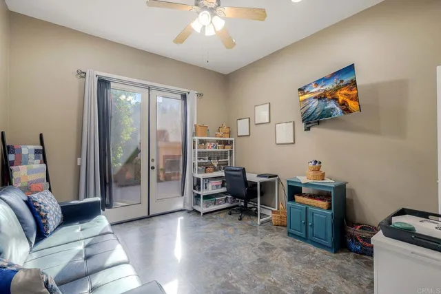 a view of a backyard with sitting area and furniture