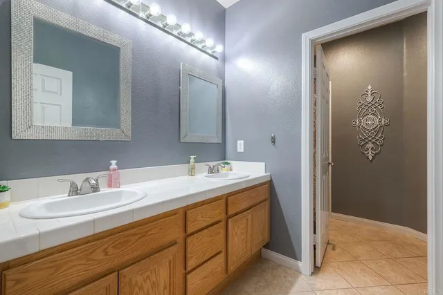 a patio with a patio table and chairs