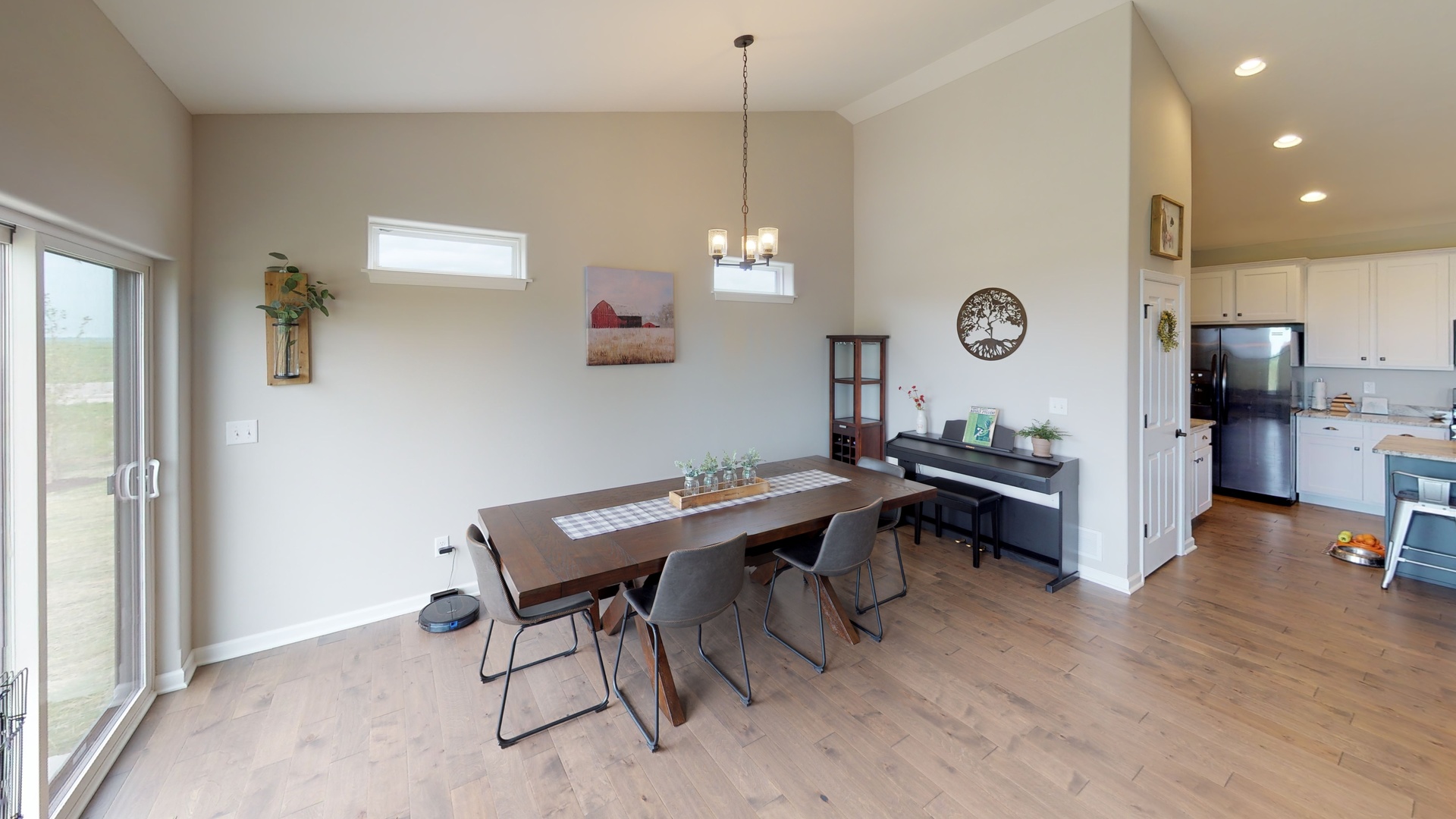 120 West Cache Isle Circle Channahon, IL 60410 - Photo 10 of 17 a view of a kitchen and a dining room with furniture window and wooden floor