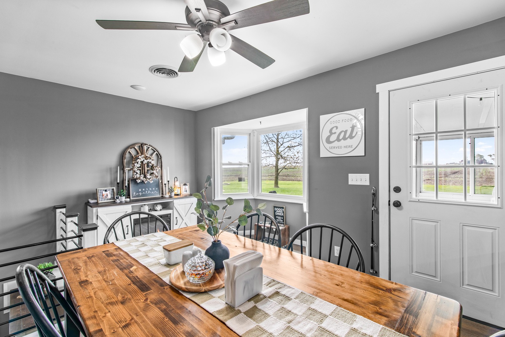 4698 East 17th Road Leland, IL 60531 - Photo 14 of 57 a view of a a dining room with furniture window and wooden floor