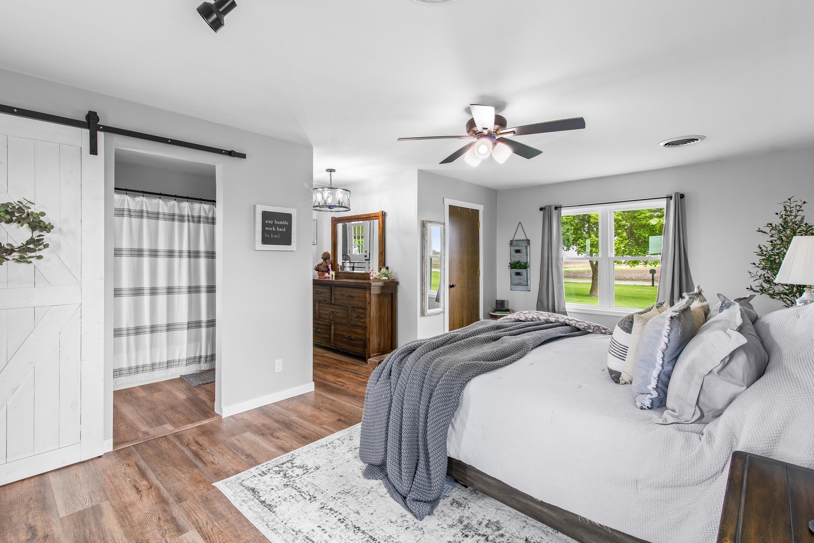 4698 East 17th Road Leland, IL 60531 - Photo 20 of 57 a bed sitting in a spacious bedroom next to a window