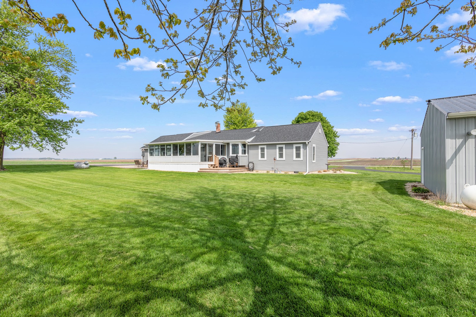 4698 East 17th Road Leland, IL 60531 - Photo 54 of 57 a view of a house with a big yard