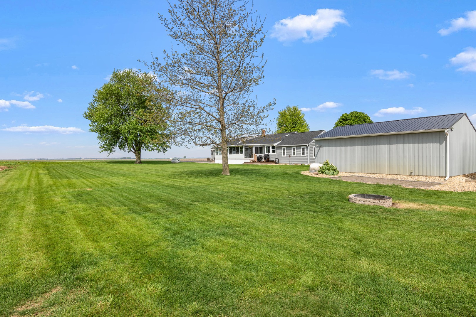 4698 East 17th Road Leland, IL 60531 - Photo 55 of 57 a view of a house with a backyard