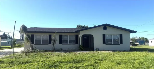 a house view with a garden space