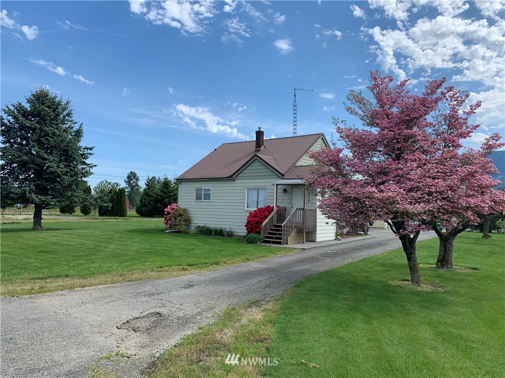 7332 Nooksack Road Everson, WA 98247 - Photo 1 of 33 a view of a house with a yard and tree s