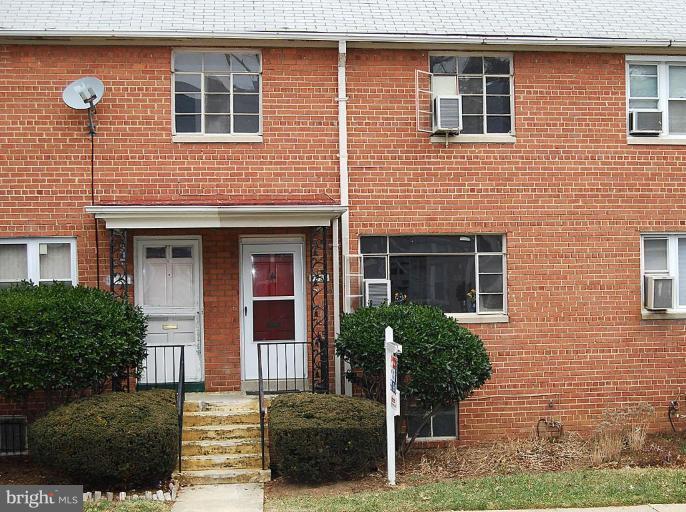 7954 Riggs Road Hyattsville, MD 20783 - Photo 1 of 1 a front view of a house with plants