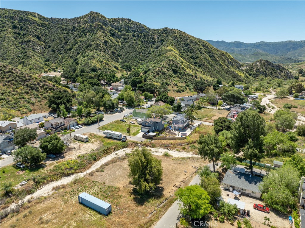 0 Taft Val Verde, CA 91384 - Photo 12 of 19 an aerial view of residential houses with outdoor space and trees