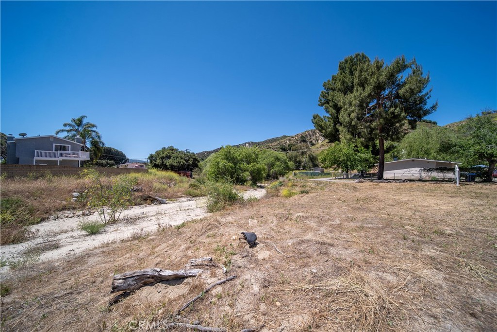 0 Taft Val Verde, CA 91384 - Photo 17 of 19 a view of a road with a yard