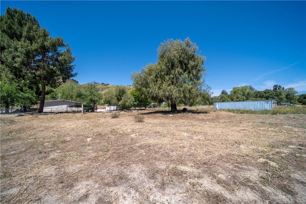 0 Taft Val Verde, CA 91384 - Photo 18 of 19 a view of backyard with outdoor space