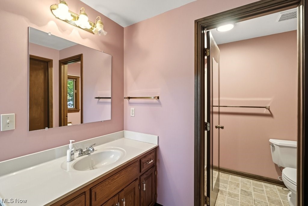 635 Inverness Road Akron, OH 44313 - Photo 33 of 36 Half bathroom featuring vanity and toilet