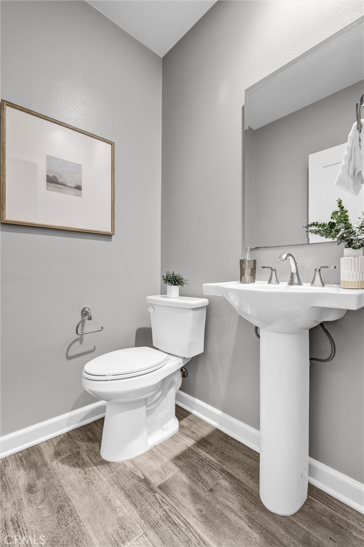 107 Copeland Irvine, CA 92618 - Photo 14 of 30 a bathroom with a sink toilet and a mirror
