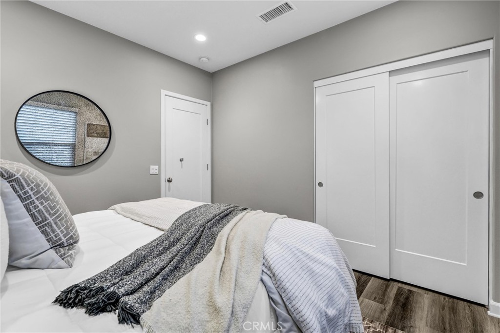 107 Copeland Irvine, CA 92618 - Photo 18 of 30 a bedroom with a bed and a window