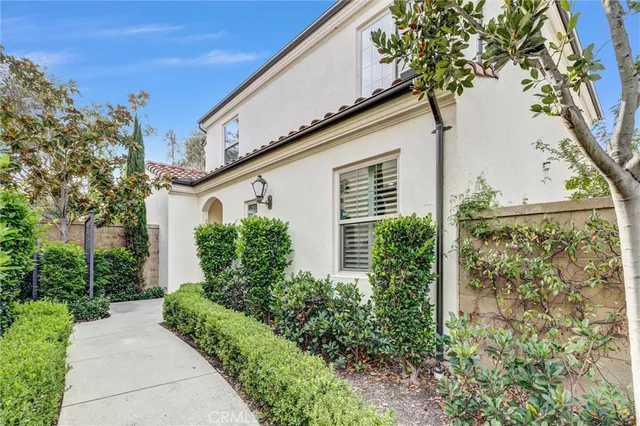 a house with a tree in front of it