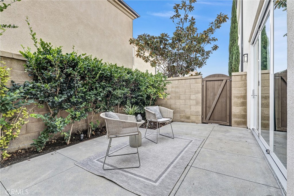 107 Copeland Irvine, CA 92618 - Photo 28 of 30 a white bench sitting in front of a building