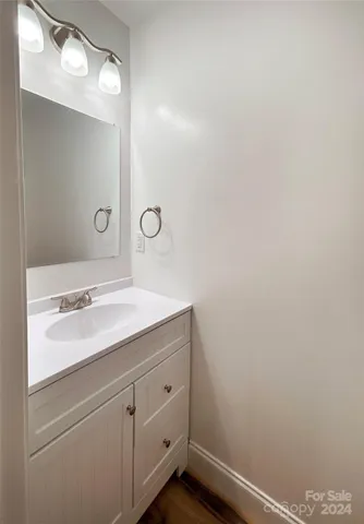 a view of a livingroom with wooden floor