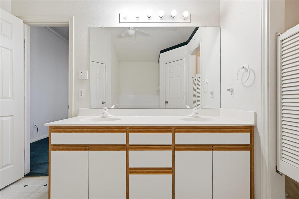 155 Rabajo Road China Spring, TX 76633 - Photo 16 of 40 a bathroom with a sink and mirror