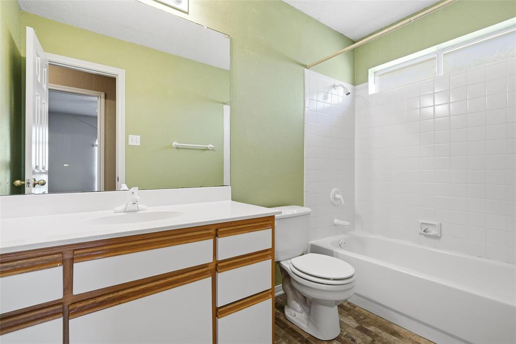 155 Rabajo Road China Spring, TX 76633 - Photo 20 of 40 a bathroom with a sink a toilet and shower