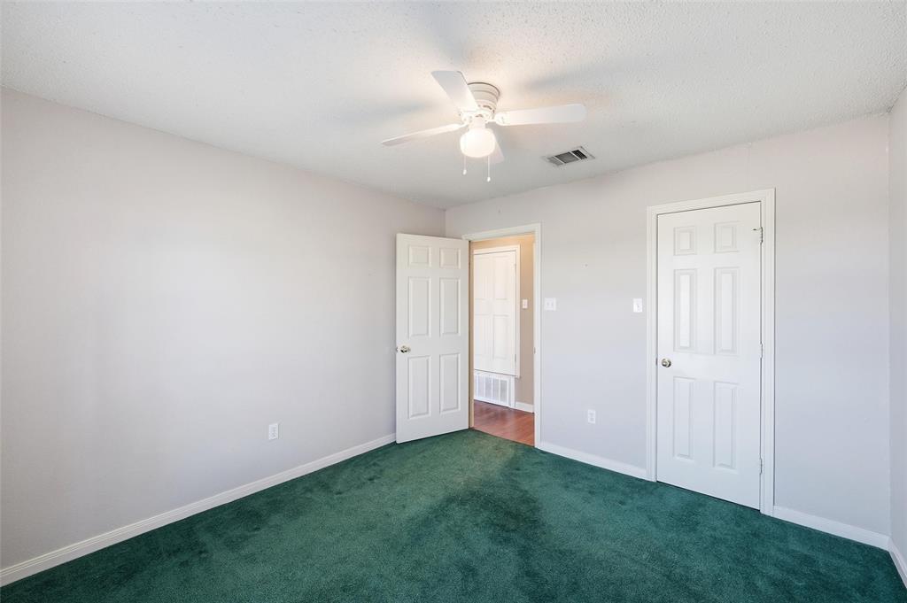 155 Rabajo Road China Spring, TX 76633 - Photo 22 of 40 a view of an empty room with chandelier fan