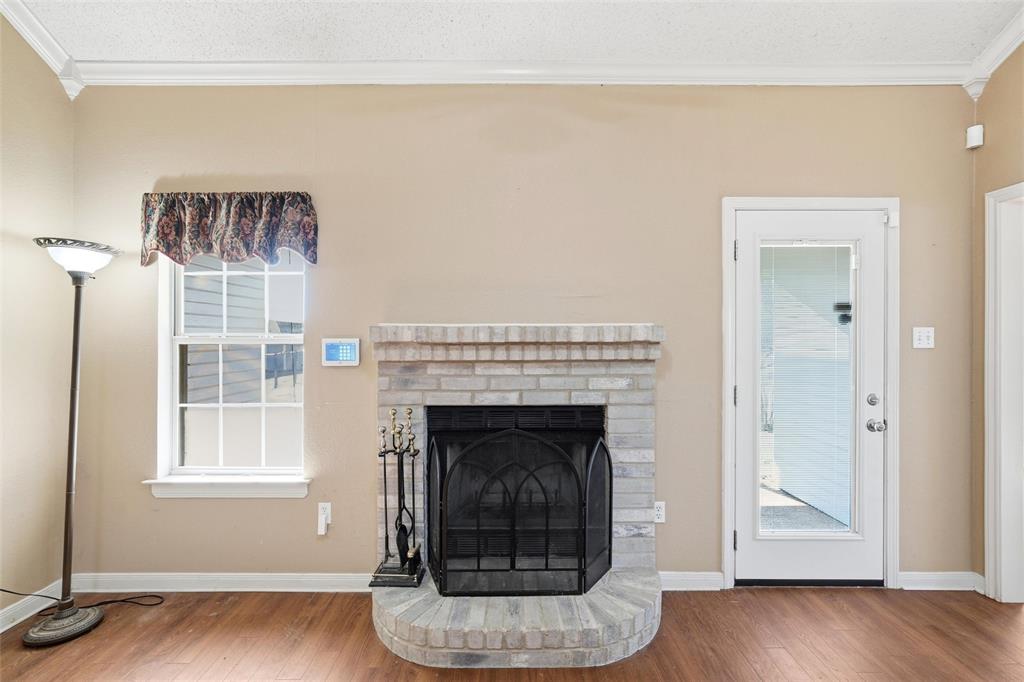 155 Rabajo Road China Spring, TX 76633 - Photo 5 of 40 a living room with furniture and a fireplace