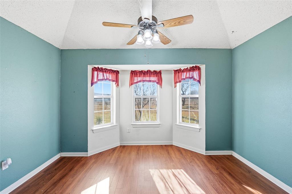 155 Rabajo Road China Spring, TX 76633 - Photo 7 of 40 an empty room with windows