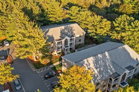 a picture of a bench in front of a wall