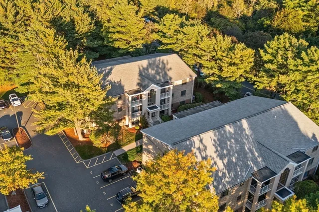 a picture of a bench in front of a wall