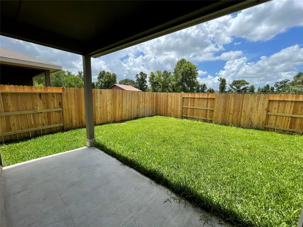 a view of a backyard with a garden