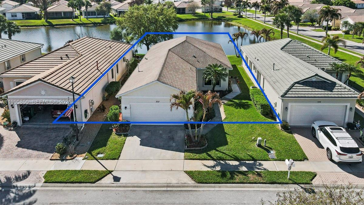 337 Southwest Maclay Way Port St. Lucie, FL 34986 - Photo 33 of 52 an aerial view of a house
