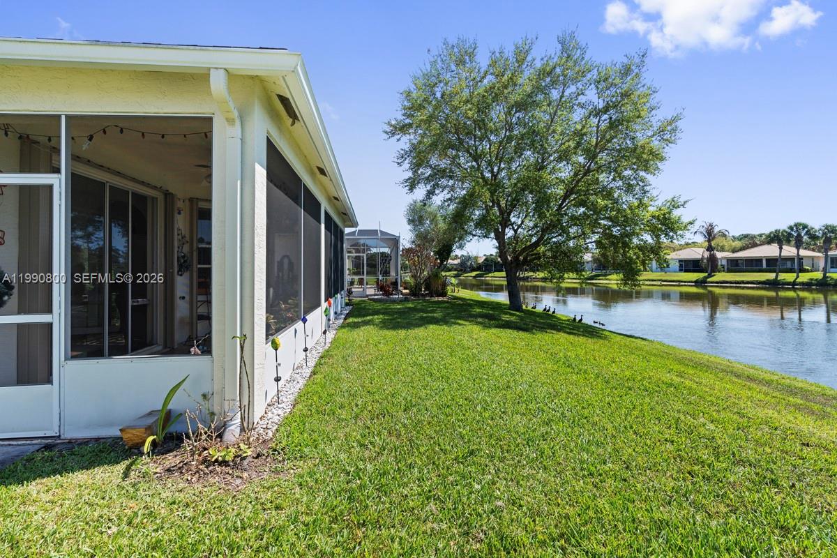 337 Southwest Maclay Way Port St. Lucie, FL 34986 - Photo 50 of 52 a view of a house with backyard and sitting area