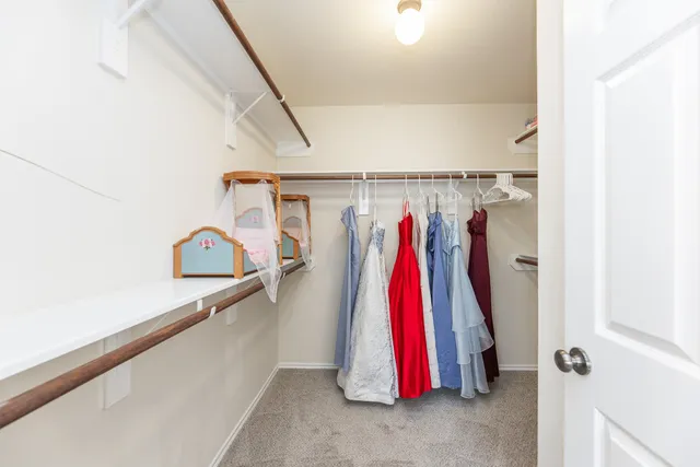 a view of a closet with storage