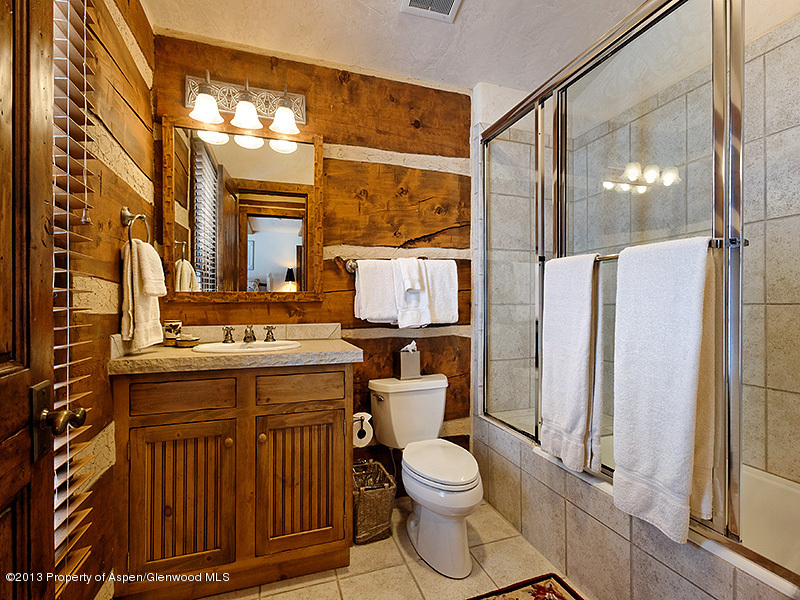 19 Arbaney Ranch Road Basalt, CO 81621 - Photo 13 of 20 a bathroom with a granite countertop sink toilet and shower