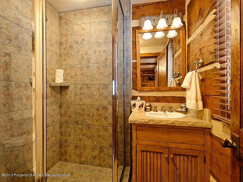 19 Arbaney Ranch Road Basalt, CO 81621 - Photo 15 of 20 a bathroom with a sink and a mirror