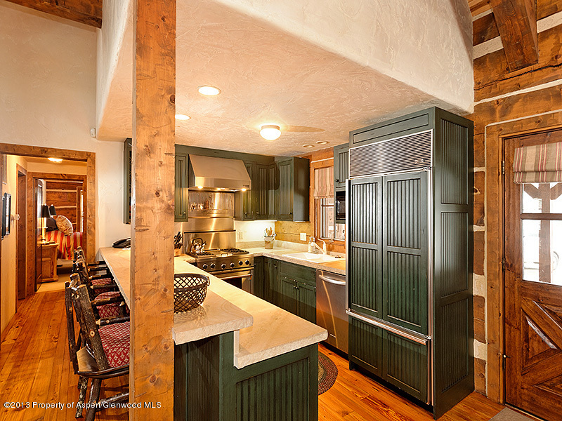 19 Arbaney Ranch Road Basalt, CO 81621 - Photo 7 of 20 a kitchen with sink refrigerator and cabinets
