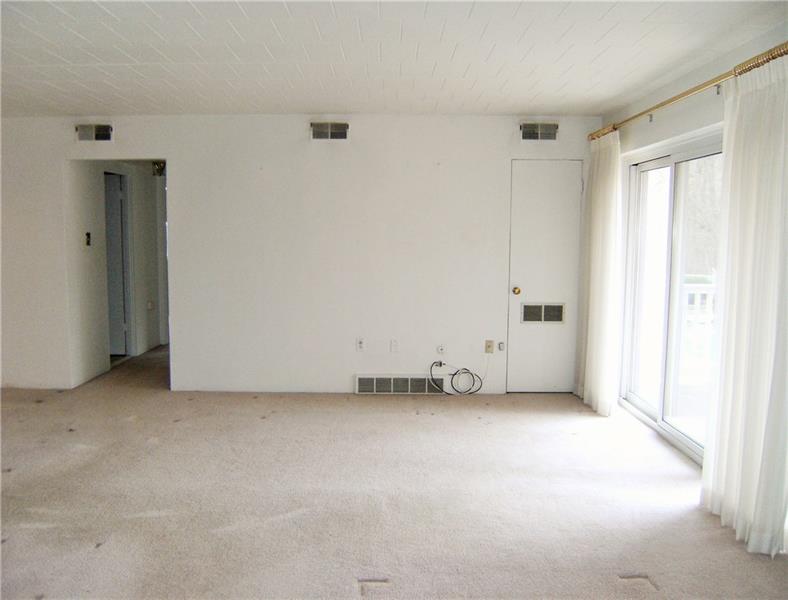 205 Coraopolis Road, Unit C6 Coraopolis, PA 15108 - Photo 4 of 16 Living Room Looking Towards Dining Room - Sliding Glass Doors To Balcony On Right