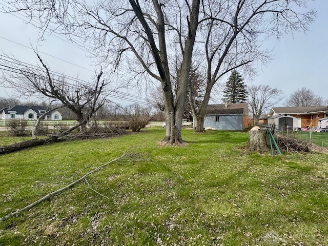4733 Curtis Drive Springfield, OH 45503 - Photo 6 of 50 This spacious yard offers a verdant canvas for outdoor living and future landscaping designs.