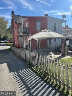 a front view of a house with balcony