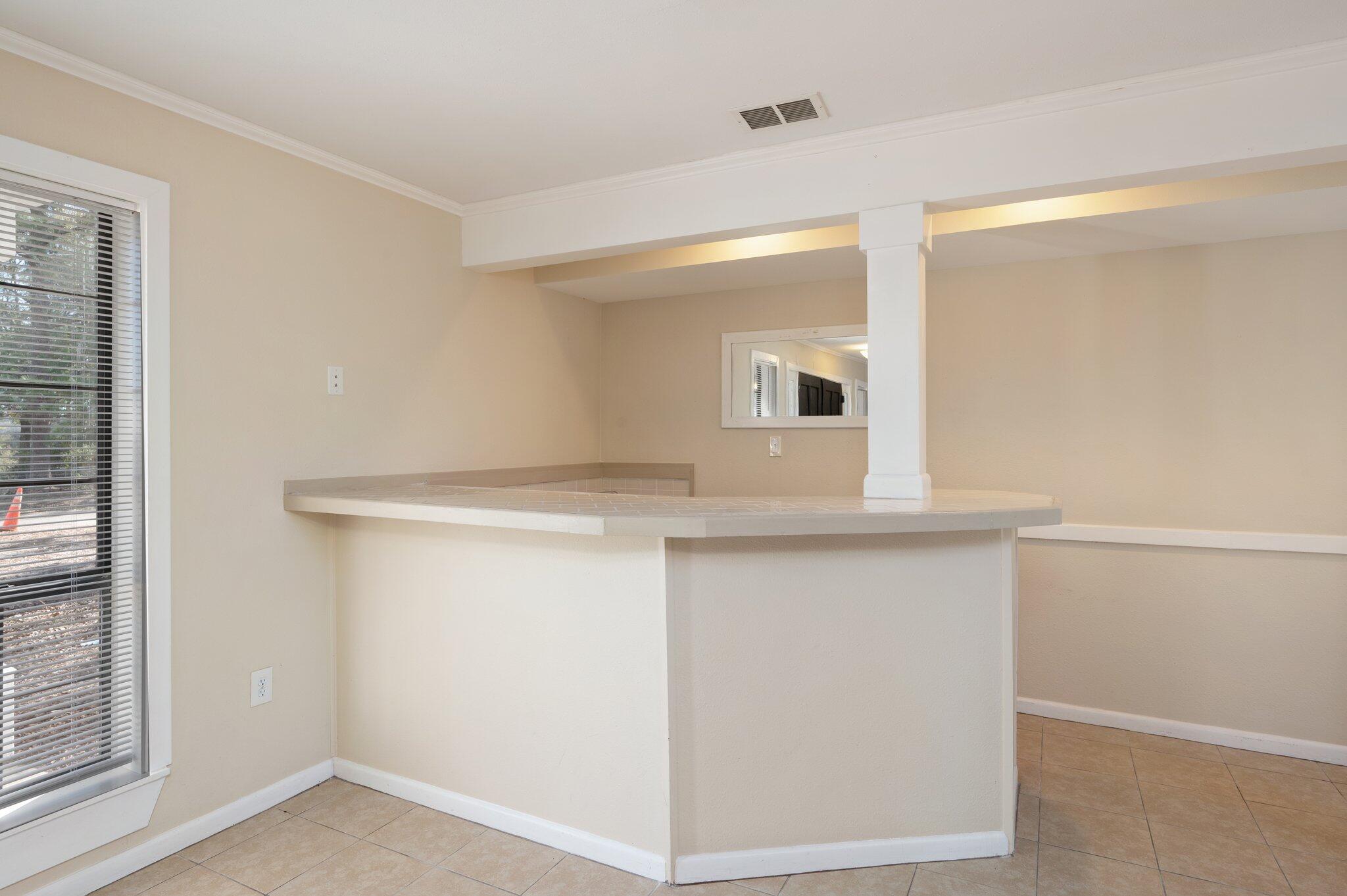 770 Lakeview Drive DeFuniak Springs, FL 32433 - Photo 15 of 32 a view of cabinets and wooden floor