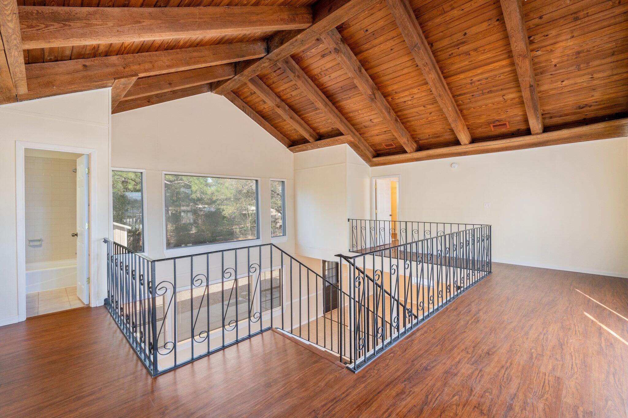 770 Lakeview Drive DeFuniak Springs, FL 32433 - Photo 21 of 32 a view of hallway with wooden floor