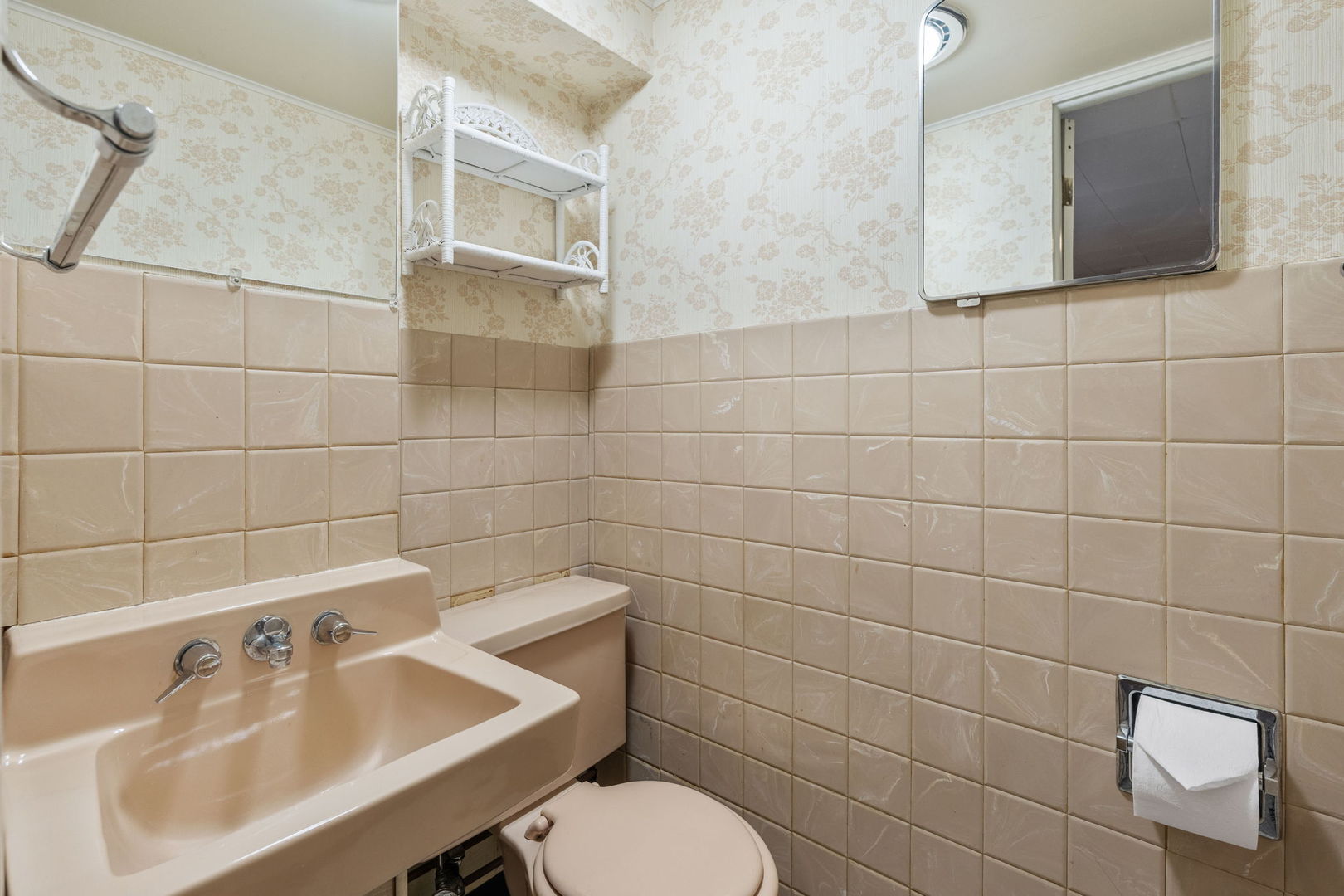 3103 15th Street A Moline, IL 61265 - Photo 16 of 33 a bathroom with a sink toilet and a mirror