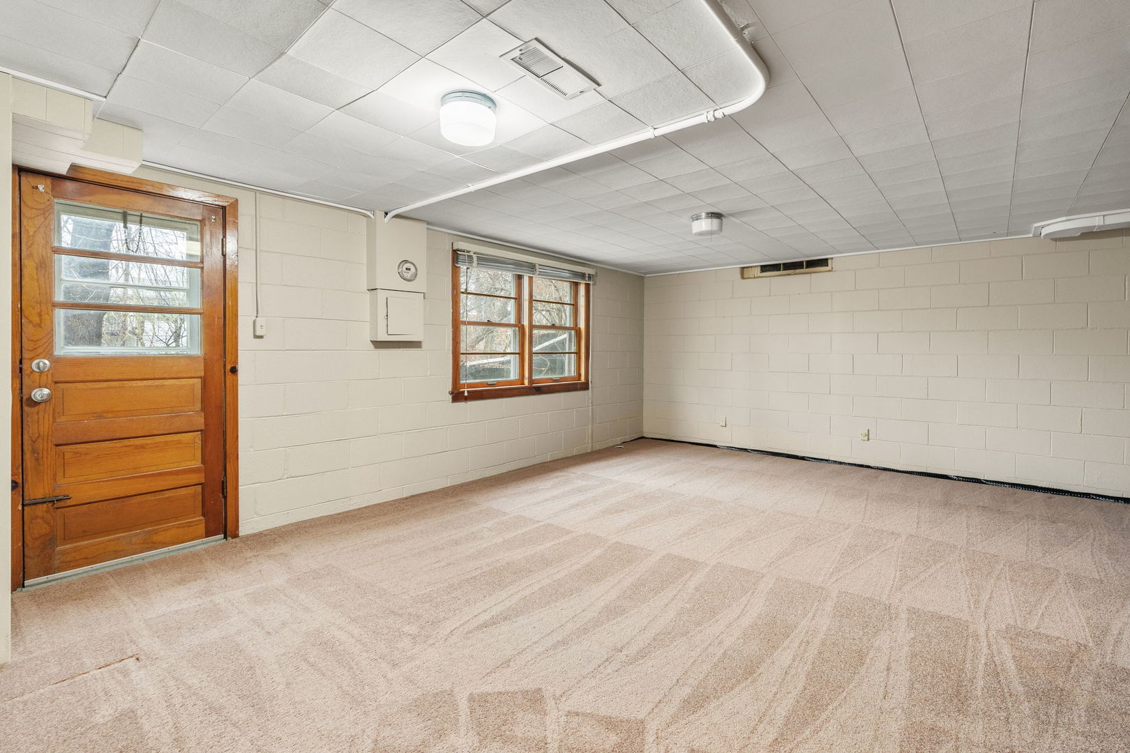 3103 15th Street A Moline, IL 61265 - Photo 21 of 33 a view of an empty room with a window