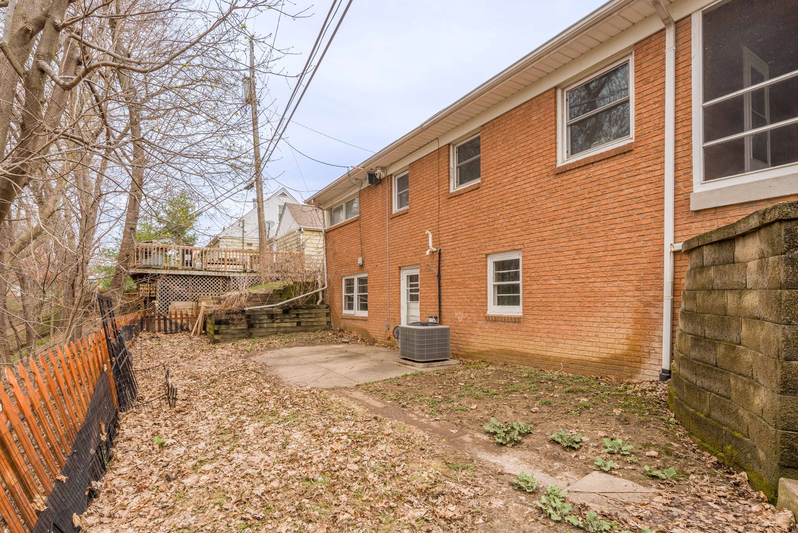 3103 15th Street A Moline, IL 61265 - Photo 29 of 33 a backyard of a house with yard and outdoor seating