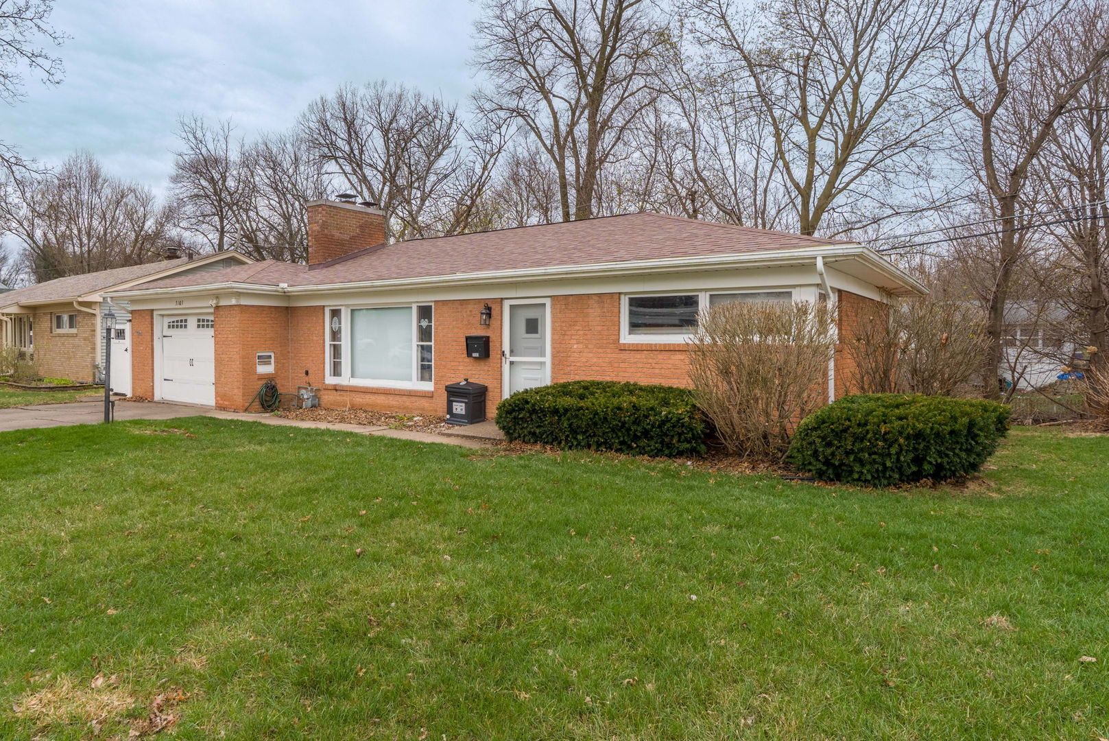 3103 15th Street A Moline, IL 61265 - Photo 3 of 33 a front view of house with yard and green space