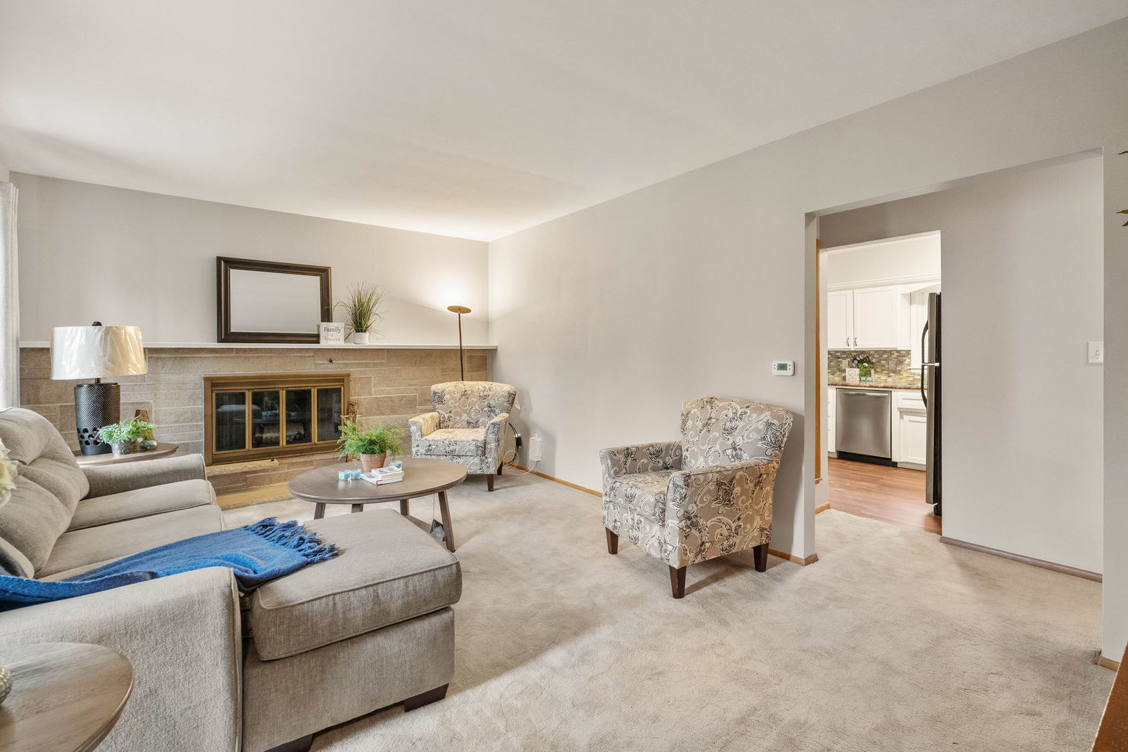 3103 15th Street A Moline, IL 61265 - Photo 4 of 33 a living room with furniture and a fireplace