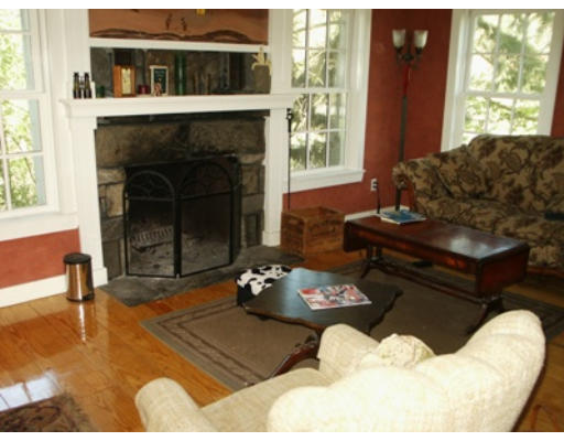 147 Gay Road Groton, MA 01450 - Photo 4 of 6 a living room with furniture window and a fireplace