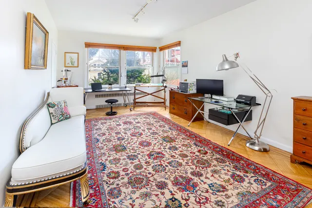 a living room with a couch and a table