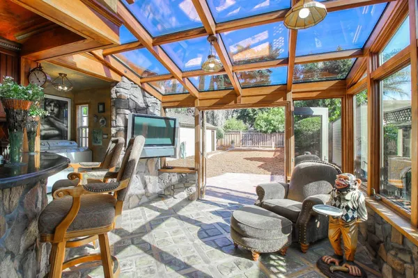 a outdoor living space with furniture and garden view