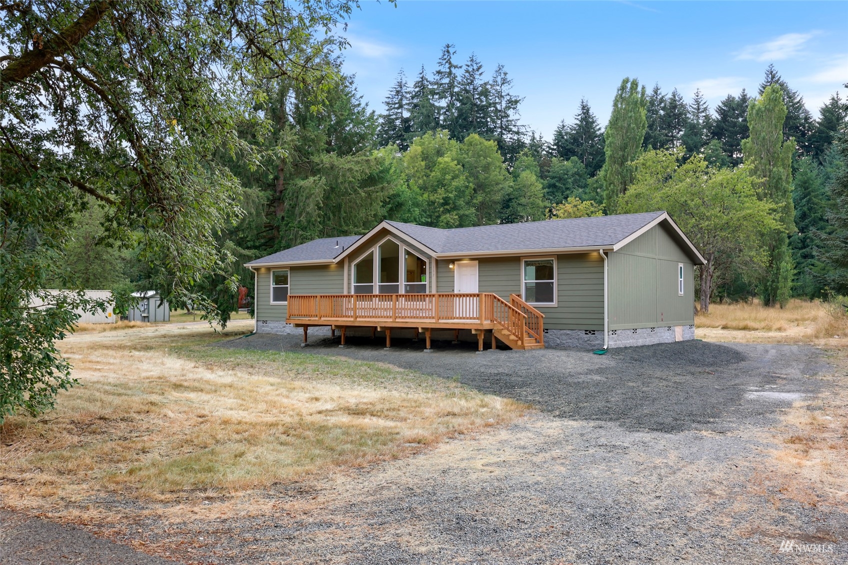 18737 Hilt Street Southwest Rochester, WA 98579 - Photo 20 of 29 a view of house with outdoor space and swimming pool