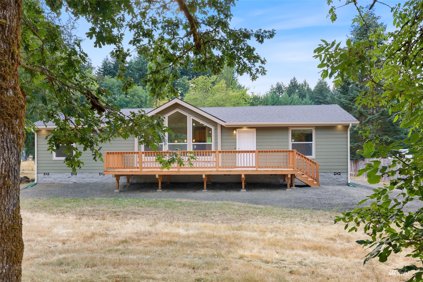 18737 Hilt Street Southwest Rochester, WA 98579 - Photo 22 of 29 a view of house with a yard