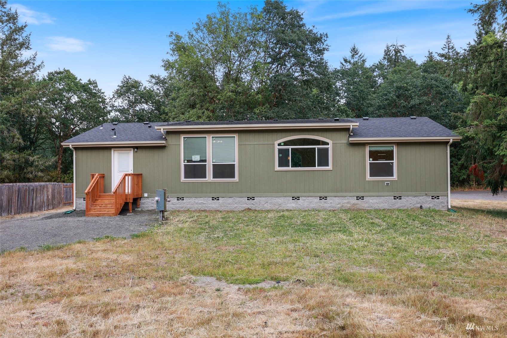 18737 Hilt Street Southwest Rochester, WA 98579 - Photo 27 of 29 a view of a house with backyard