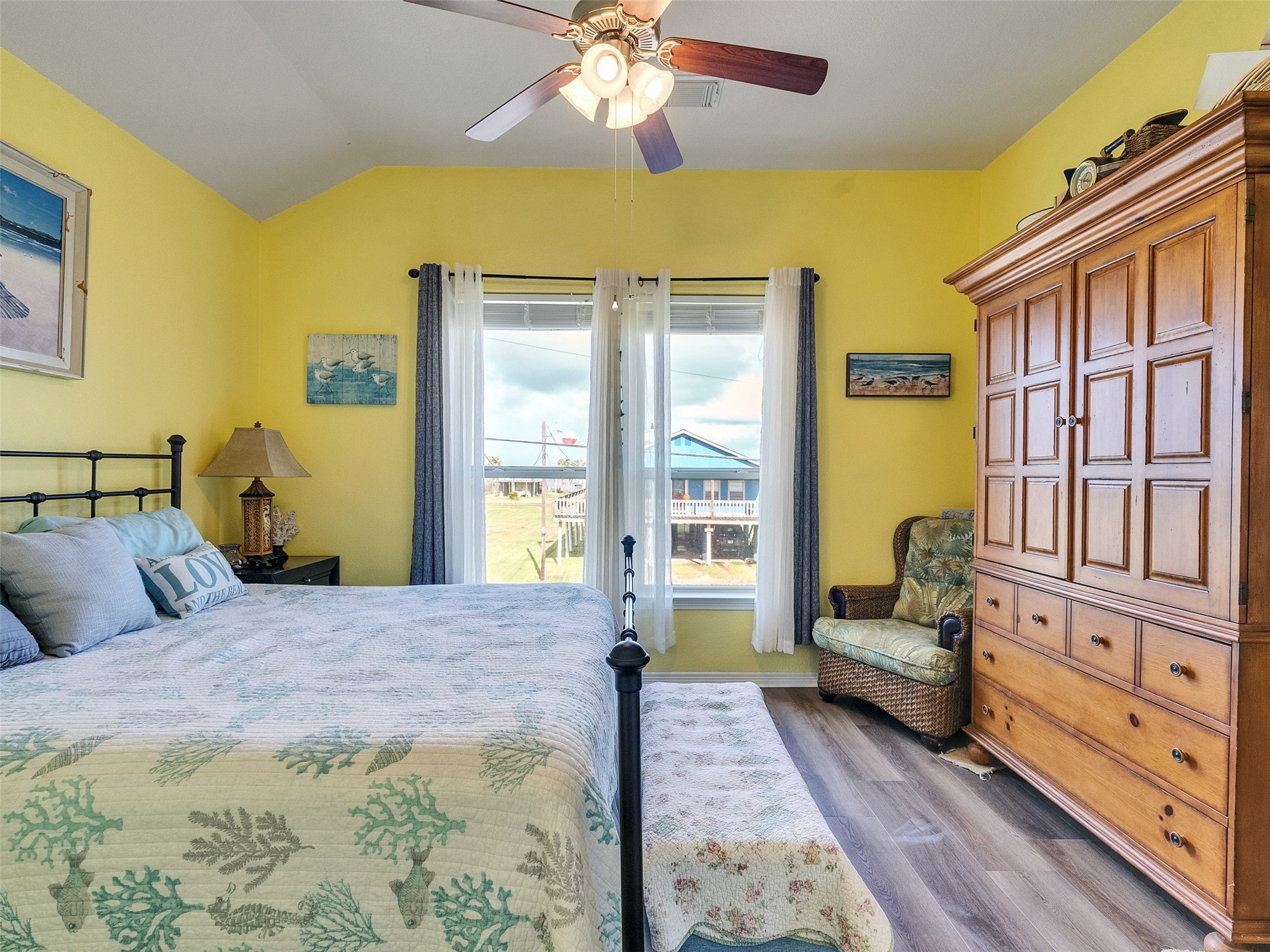 4710 Palm Street Freeport, TX 77541 - Photo 18 of 23 a spacious bedroom with a large bed and a window